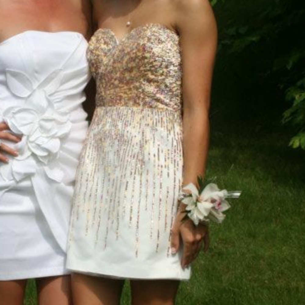 Terani Couture dress worn to prom. Gold and pink sequin corset